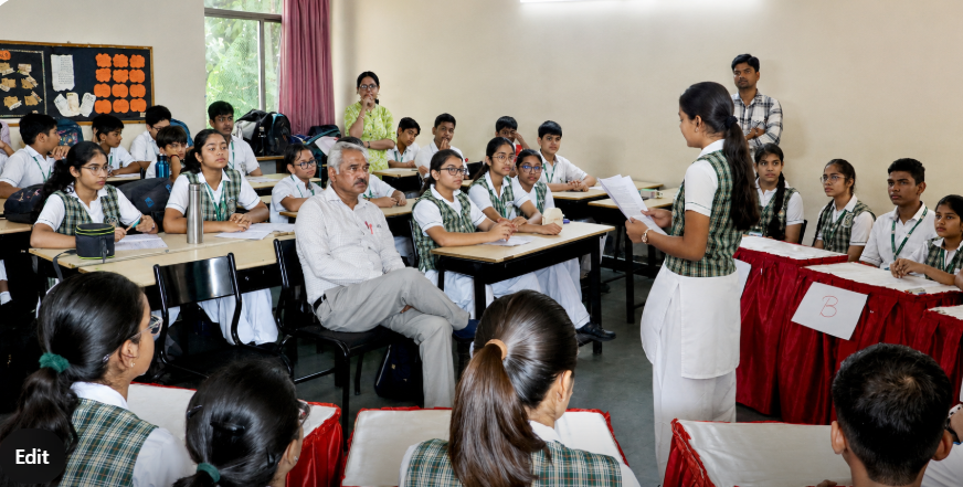 DPS Agra students participating in classroom debate during Friday Competitions